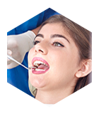 Young woman receiving dental exam