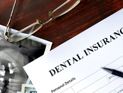 Dental insurance coverage for dental implants in Friendswood paperwork